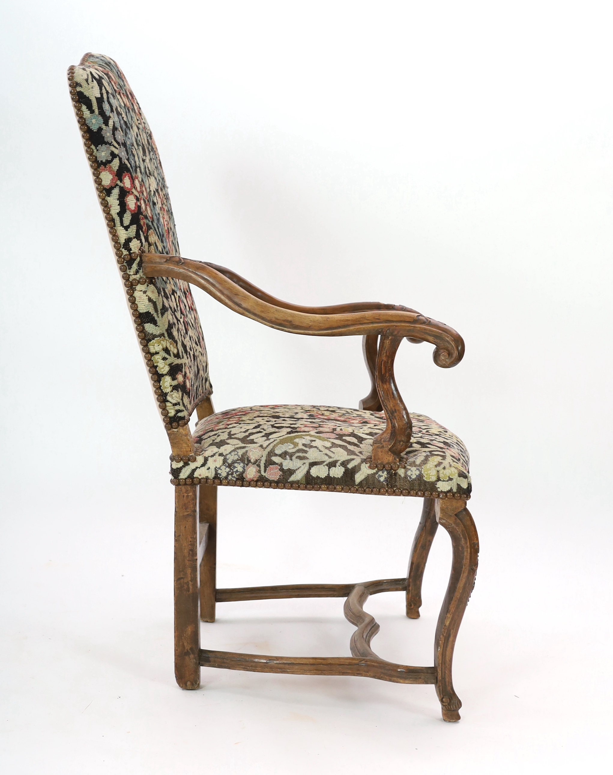 A Louis XIV walnut armchair, width 71cm, depth 80cm, height 124cm